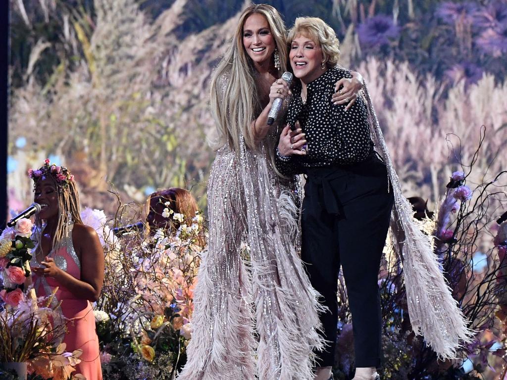 Jennifer Lopez performed ‘Sweet Caroline’ onstage with her mother Guadalupe Rodriguez. (Photo by Valerie Macon / AFP