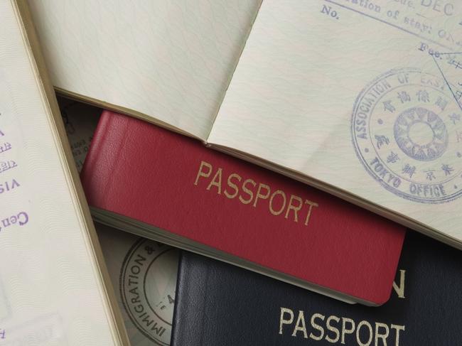 Stacked passports and Stamp Page.Studio shot.