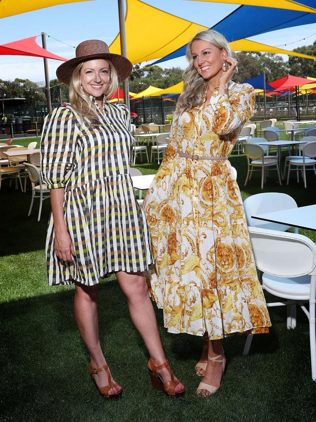 Abby Thomas and Amy Schapel dressed in Elle &amp; Elka in the Village Green at Adelaide Oval. Picture: Sarah Reed.