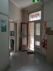 Inside Auburn ambulance station. Left: the central entrance hall and (right) the hall towards the ambulance bays at the back.