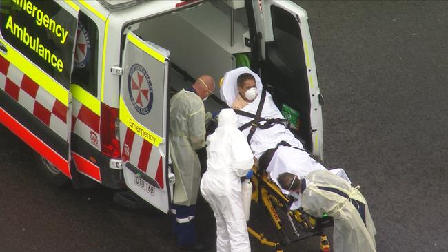 A sick crew member on the Ruby Princess is taken off the ship and to a Sydney hospital for treatment. Picture: 7News