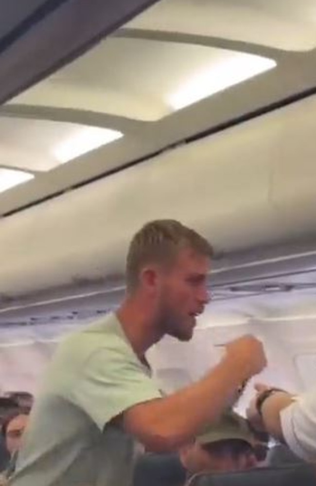 Footage shows the Brit yelling before storming towards the front of the plane. Picture: TikTok