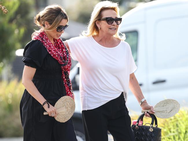 Dannii Minogue and Sue Gudinski arrive at Shane Warne’s funeral. Picture: Ian Currie