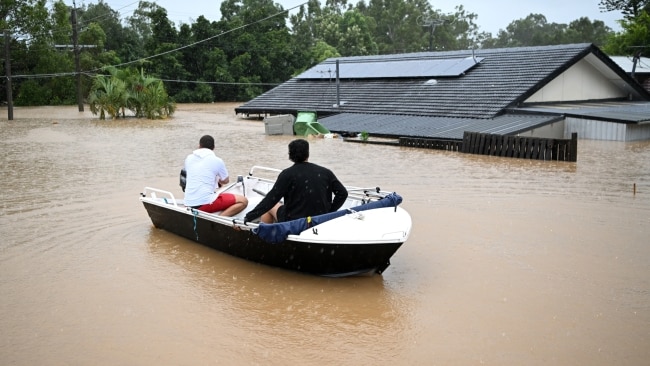 Residents escaped using their boats, which they later used to help neighbours and other surrounding locals. Picture: Dan Peled/Getty Images
