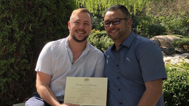 Correctional services manager and syndicate member Stewart Iain Berry, left, and his husband, fellow child abuse offender Mathew Campbell, right, on their wedding day.