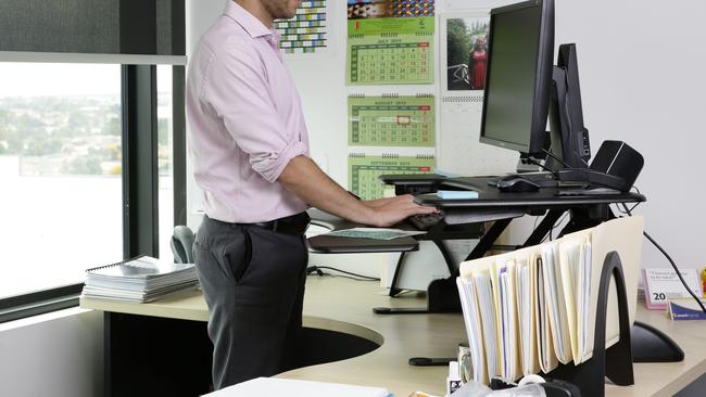 Standing desks are all the rage — but do the health benefits stand up?