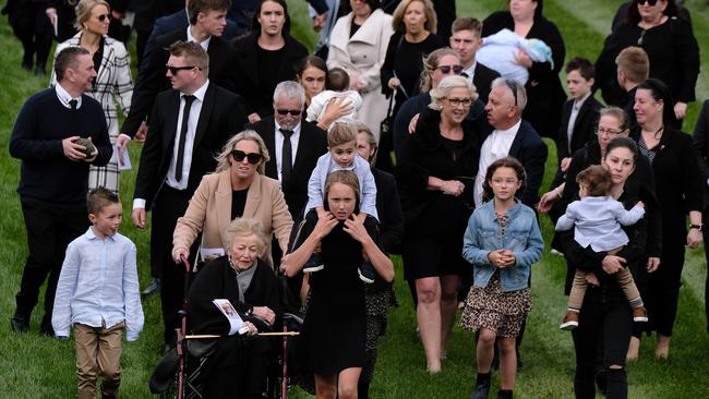 Dean Holland’s family lead the guard of honour.