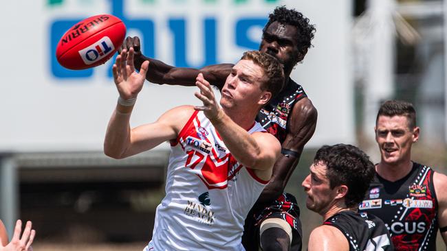 Toby Hutt and Karlson Kantilla battle for the ball as Waratah played the Tiwi Bombers in Round 6 of the 2023-24 NTFL season. Picture: Pema Tamang Pakhrin