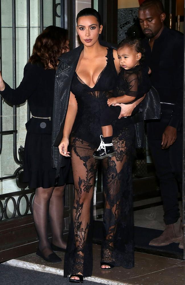 Kim Kardashian, Kanye West and North West leave the 'Art District' apartments in Paris.