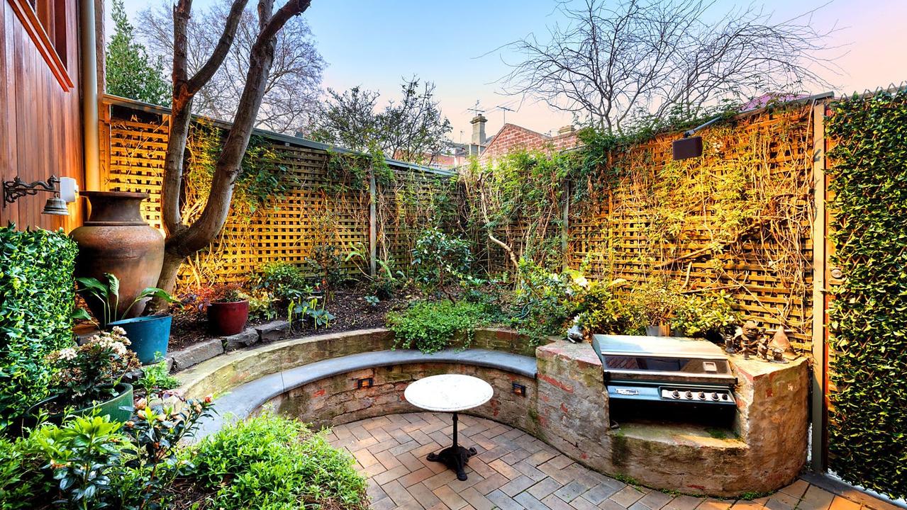 The couple combined the two properties at No. 2 and No. 4 to create an inner city garden oasis.