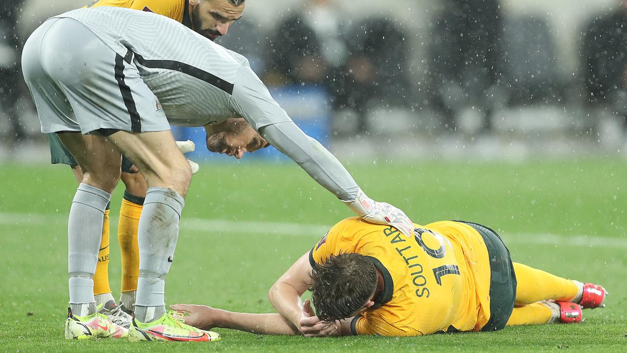 Mathew Ryan checks on Souttar after his knee injury. Picture: Mark Metcalfe/Getty Images