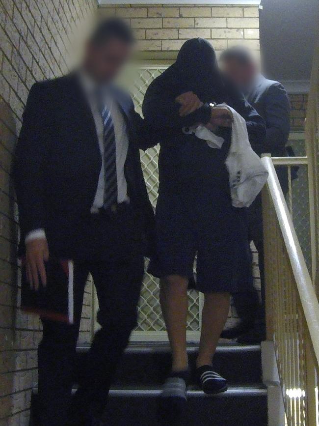 Ahmed Jarkas being taken into custody. Picture: NSW Police