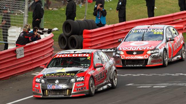 Garth Tander pips rival Craig Lowndes to win the Bathurst 1000 in 2011 at Mount Panorama in Bathurst, NSW.