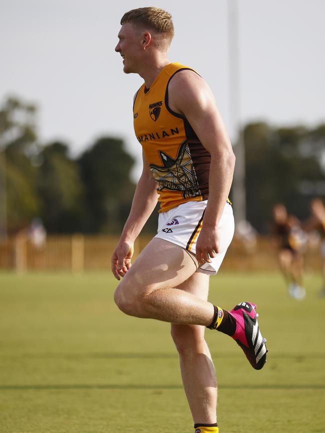 James Sicily lifts his left ankle after an injury scare.