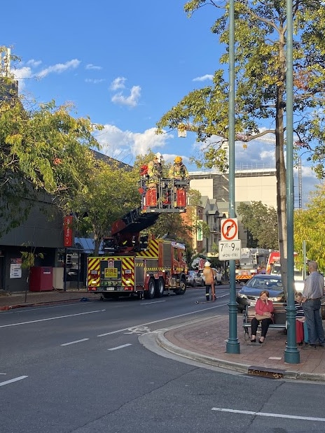 Fire fighters at the scene of the fire at the Comfort Hotel Meridien in Melbourne St, North Adelaide. Picture: Tia Ewen