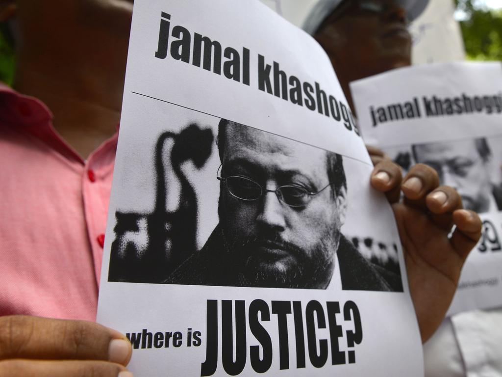 Members of the Sri Lankan web journalist association hold placards with the image of Jamal Khashoggi during a demonstration outside the Saudi Embassy in Colombo. Picture: AFP