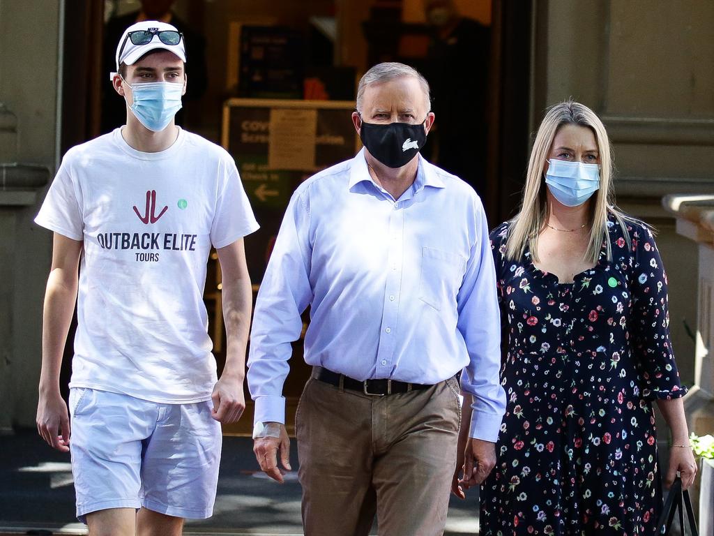 Mr Albanese pictured leaving hospital the day after the car accident with partner Jodie Haydon and son Anthony. Picture: Gaye Gerard