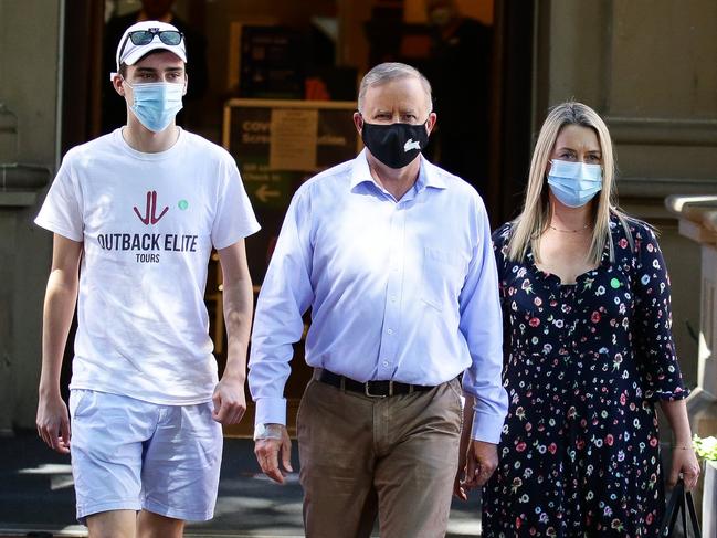 Mr Albanese pictured leaving hospital the day after the car accident with partner Jodie Haydon and son Anthony. Picture: Gaye Gerard