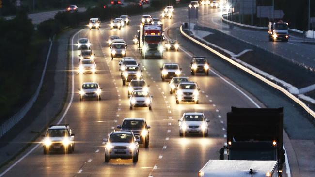 The M1 lights up — after 4am, the traffic takes off from Coomera. Picture Glenn Hampson