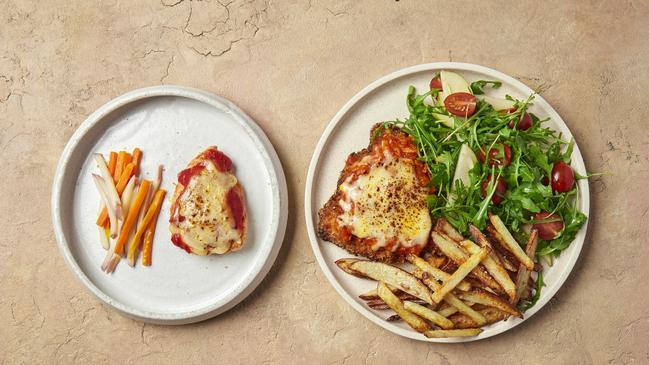 The puppy parmigiana from ilume with Atlas Weekly’s chicken parma.