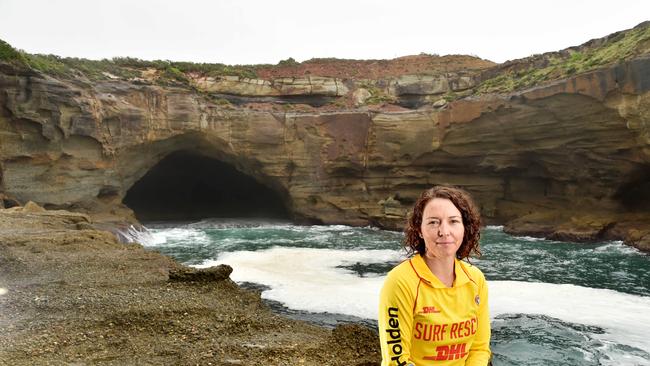 Brianna Coyte, a Toowoon Bay SLSC member, near the Snapper Point sea cave at Frazer Park. She played a major role in the rescue of two teenagers from drowning at the notoriously dangerous inlet. Picture: AAP IMAGE / Troy Snook