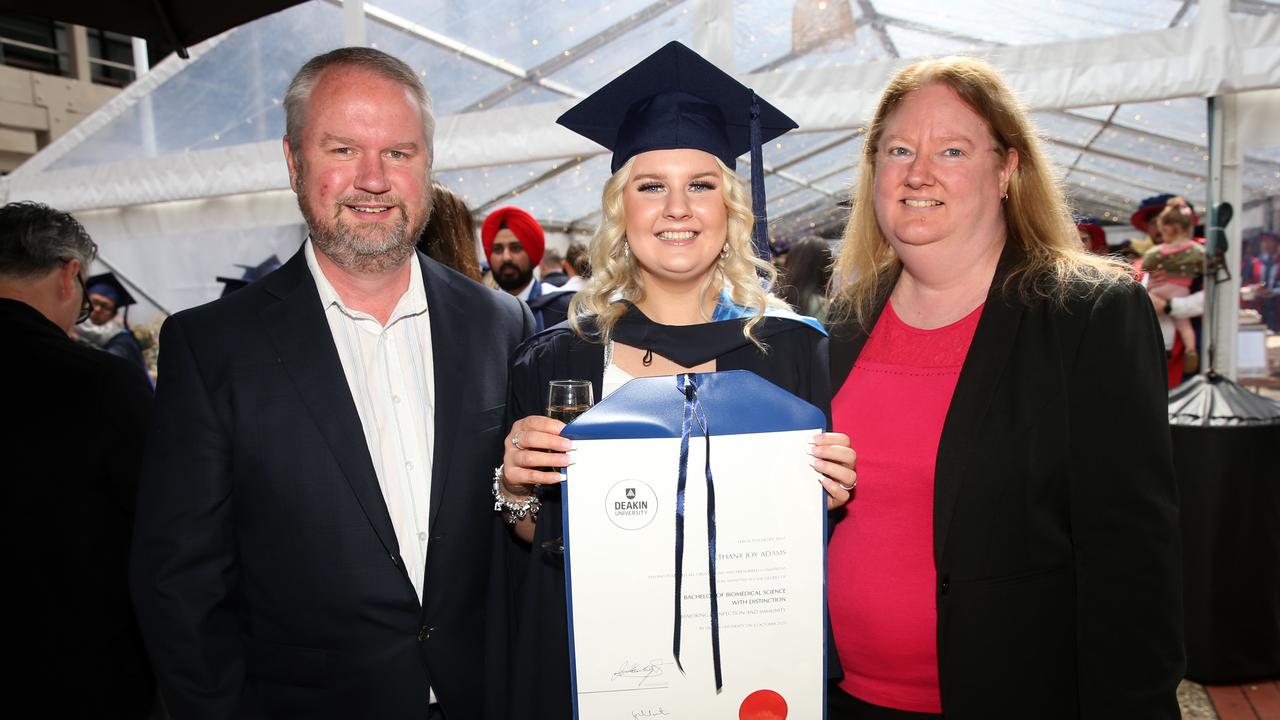 Scott, Bethany and Catherine Adams at Deakin University post-graduation celebrations on Friday afternoon. Picture: Alan Barber