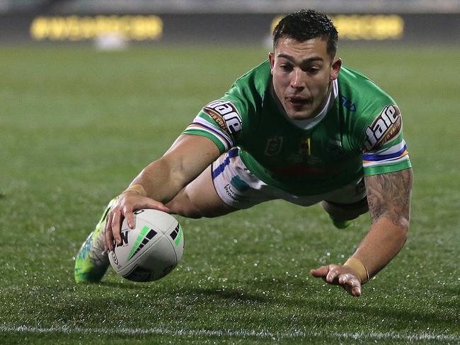 CANBERRA, AUSTRALIA - JULY 11: Nick Cotric of the Raiders scores a try during the round nine NRL match between the Canberra Raiders and the Melbourne Storm at GIO Stadium on July 11, 2020 in Canberra, Australia. (Photo by Matt King/Getty Images)