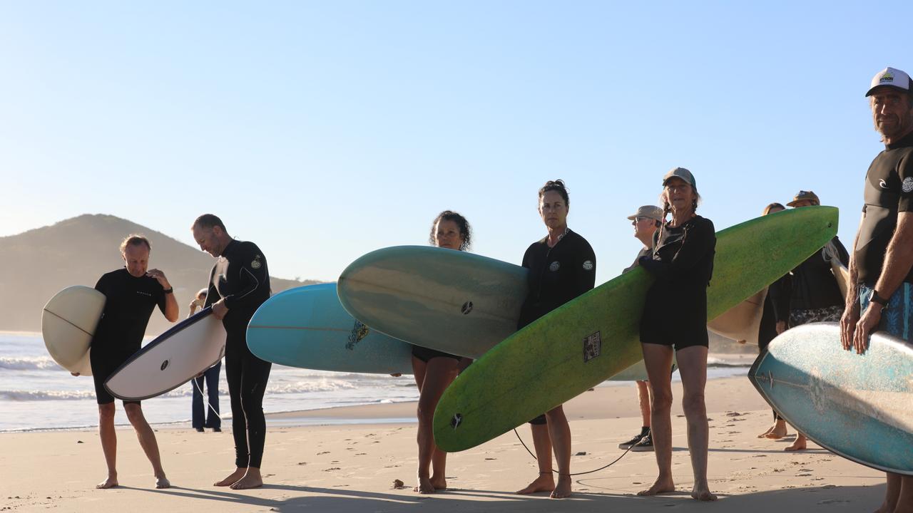 Members of the public took part in a paddle-out at Byron Bay's Main Beach to protest against the planned Netflix reality show Byron Baes on the morning of Tuesday, April 20, 2021. Picture: Liana Boss