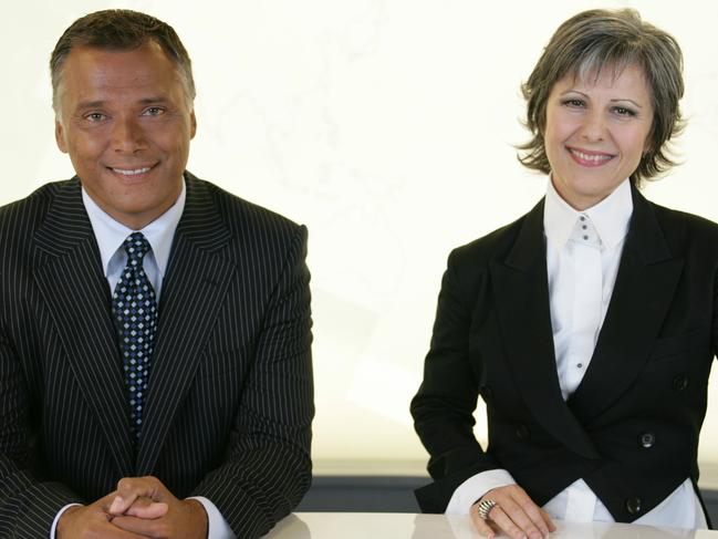 TV presenter journalist Stan Grant with Mary Kostakidis from news program "SBS World News bulletin" 16 Jan 2007.