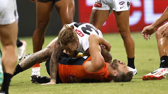 Giants Callan Ward is injured in this tackle by Collingwood's Beau McCreery during the AFL Opening Round match between the GWS Giants and Collingwood Magpies at Engie Stadium, Sydney on March 9, 2024. Photo by Phil Hillyard (Image Supplied for Editorial Use only - Phil Hillyard **NO ON SALES** - Â©Phil Hillyard )