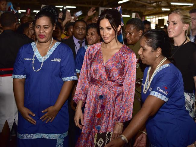 The female bodyguard, on far right, has left the job after less than a year. 