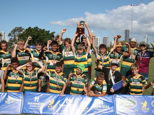 Finals of the King of the Country junior rugby union tournament at Gold Coast Eagles Rugby Union Club. U/13  betweenSurfers Paradise Dolphins (yellow and green) and Noosa Dolphins. Surfers celebrate. Picture Glenn Hampson