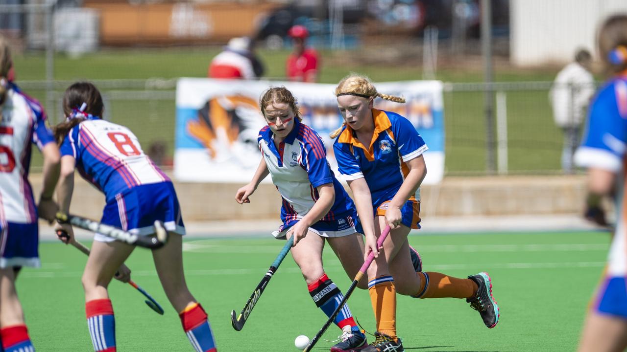 Ava Purcell (left) of Rangeville and Erin Seibuhr of Newtown in J2 girls grand final hockey at Clyde Park, Saturday, September 10, 2022. Picture: Kevin Farmer