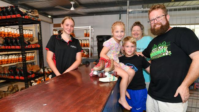 Picking up a set of skates for his daughter at the opening of Rollerworld in Lismore. From left, Evie McKenzie, siblings Mackenzie and Jakobe Jones with their dad Tristan and Gran, Mrs Jones. Picture: Cath Piltz