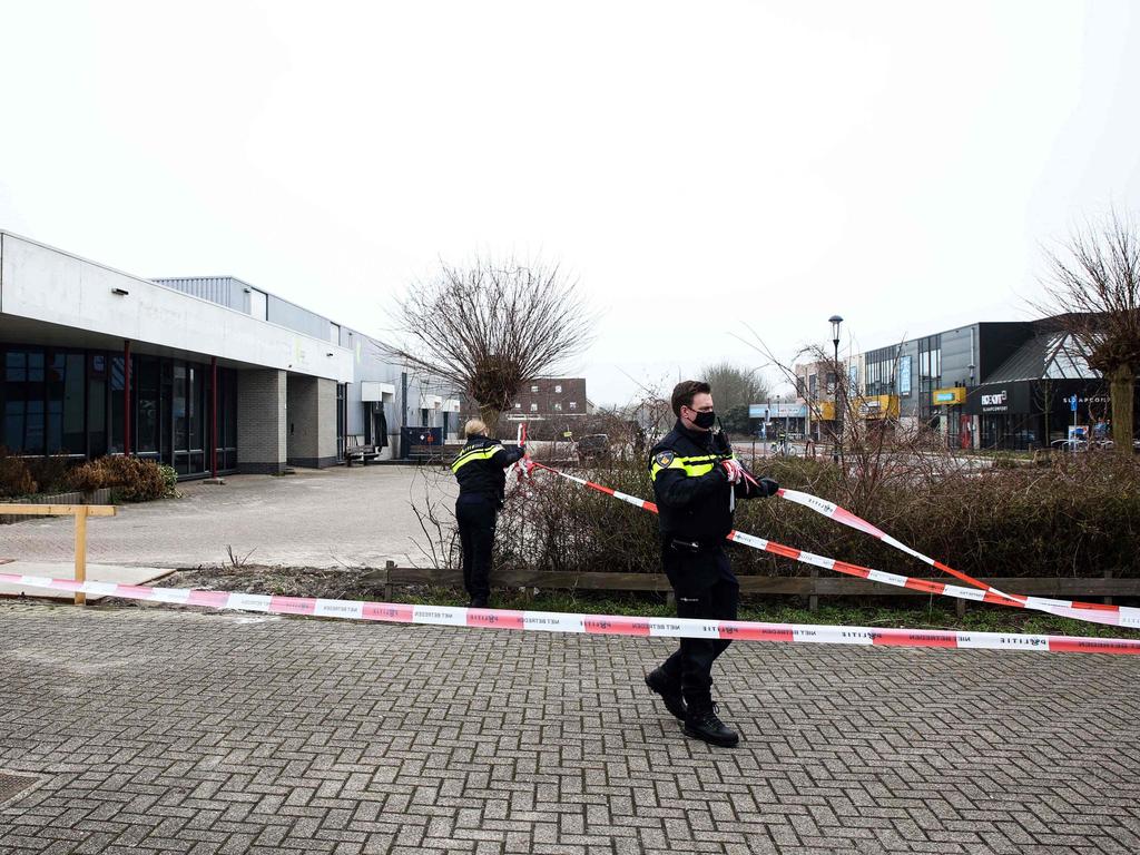 Dutch police officers at a testing centre in Bovenkarspel, northern Netherlands, following an explosion in an area close to where a testing centre was burnt down last January. Picture: AFP