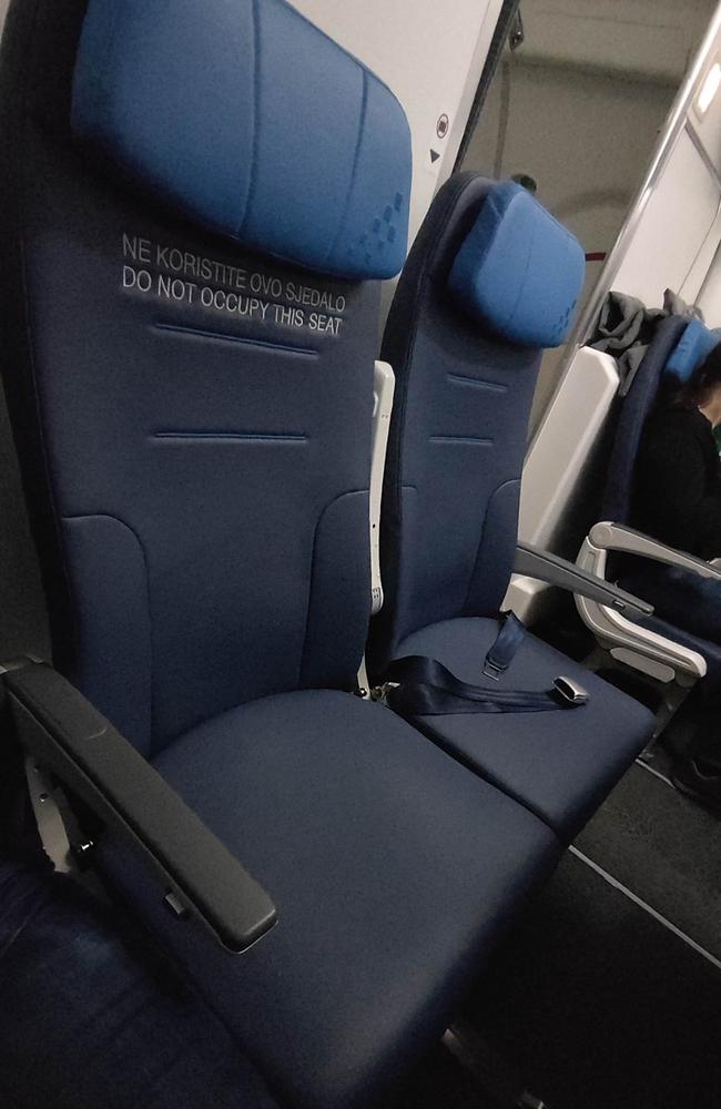 A passenger shared the picture of the banned seat next to him, baffling people online. Picture: Facebook / Sven Wöste