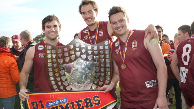 Hayden Jolly (right) celebrating an Old Reds’ premiership way back in 2016. The midfielder has been a force for the club for years. Picture: Stephen Laffer