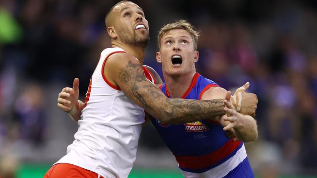 Lance Franklin battles Bulldogs stopper Alex Keath. Picture: Michael Klein