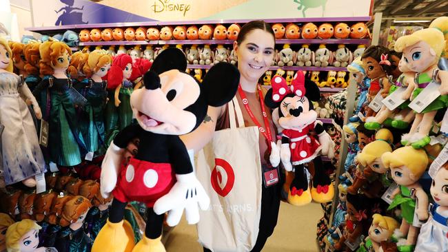 Target has returned to Cairns Central, with new additions like the Far North's first Disney department. Customer service assistant Naomee McGee with some of the Disney merchandise in the new-look store. Picture: Brendan Radke