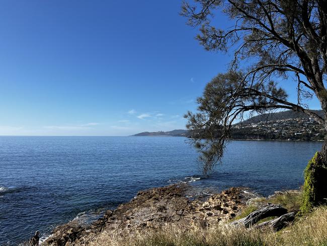 The rocky shoreline at the northern end of Blackmans Bay Beach.