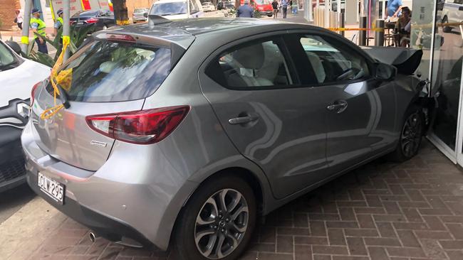 A car ended up just centimetres from a popular Manly eatery, Fusion Point, after its driver suffered a medical episode and lost control of the vehicle in Wentworth St, near Rialto Ln. Picture: Jim O'Rourke