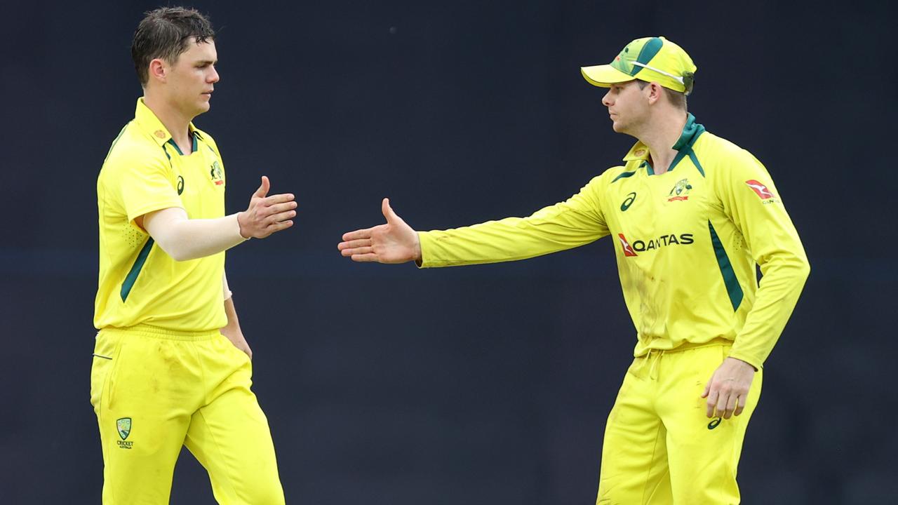 KANDY, SRI LANKA - JUNE 16: Mitchell Swepson of Australia is congratulated by Steven Smith after dismissing Dasun Shanaka of Sri Lanka during the 2nd match in the ODI series between Sri Lanka and Australia at Pallekele Cricket Stadium on June 16, 2022 in Kandy, Sri Lanka. (Photo by Buddhika Weerasinghe/Getty Images)