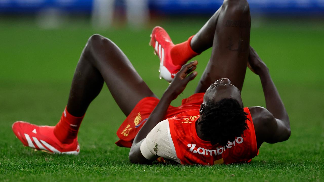 Mac Andrew injured his ankle. Picture: Michael Willson/AFL Photos via Getty Images