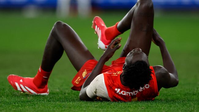 Mac Andrew injured his ankle. Picture: Michael Willson/AFL Photos via Getty Images