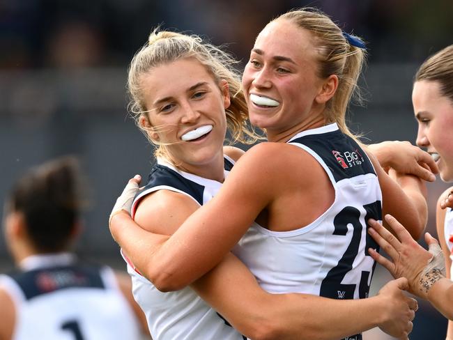 MELBOURNE, AUSTRALIA - OCTOBER 27: Keeley Sherar of the Blues is congratulated by team mates after kicking a goal during the round nine AFLW match between Collingwood Magpies and Carlton Blues at Victoria Park, on October 27, 2024, in Melbourne, Australia. (Photo by Quinn Rooney/Getty Images)