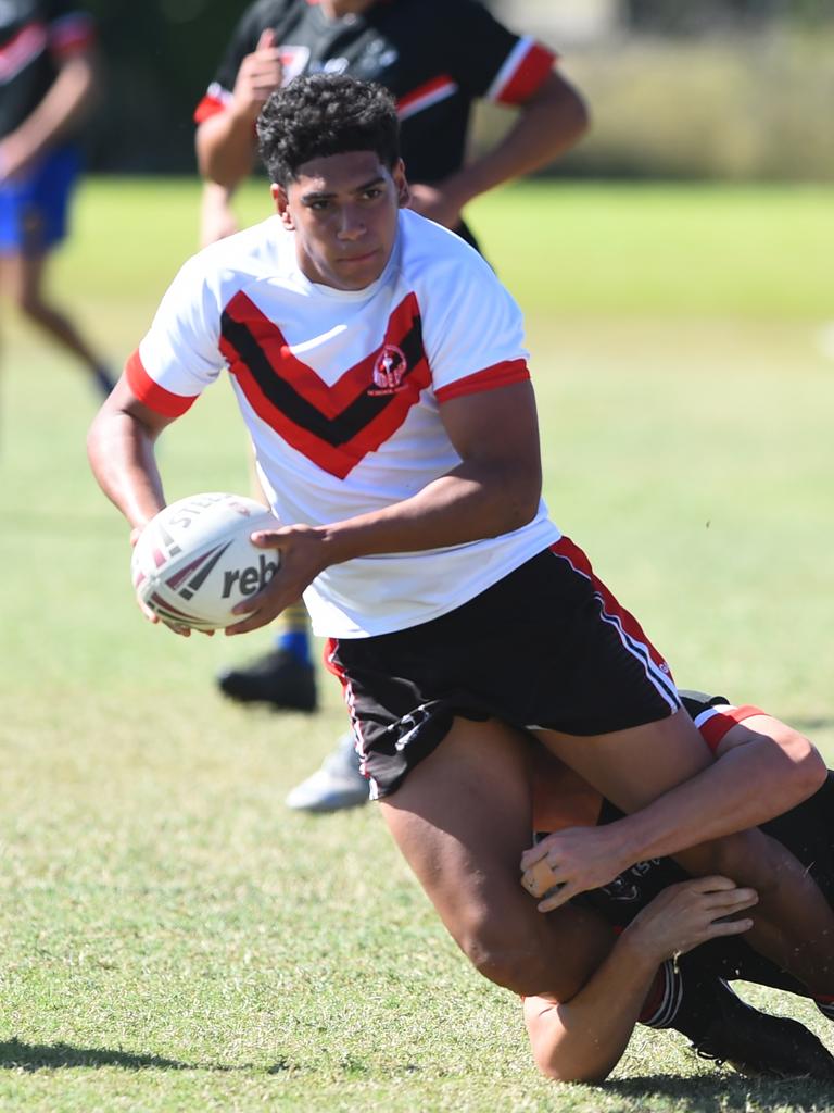 Boys Rugby League State Championship held at Northern Division, Brothers Leagues ground, Townsville. South West (black) v Wide Bay (white). 16-18 years. Noah Law of Shalom College.