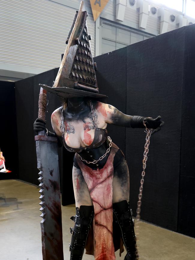 Some took a more dramatic route in their cosplay than others, with Pyramid Head from Silent Hill managing to navigate her way through the crowds. Picture: NewsWire / Damian Shaw