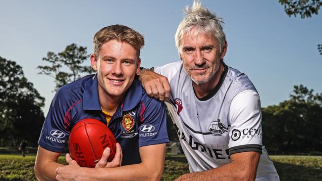 Former Lions player Adrian Fletcher alongside son Jaspa Fletcher, who has been training with the Lions this preseason. Picture: Zak Simmonds