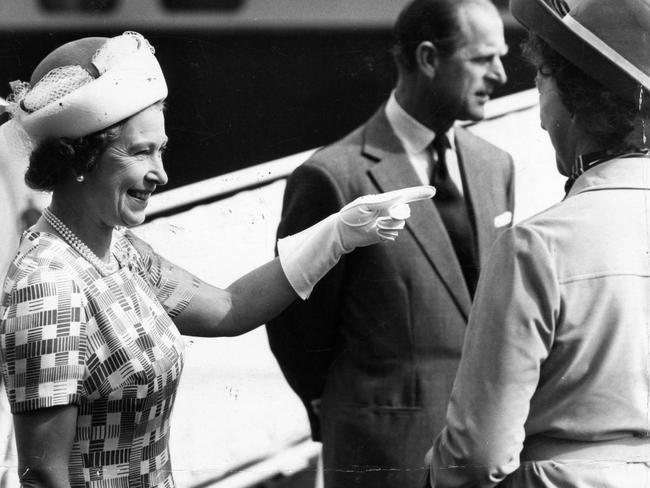 . The Queen talks with Port Adelaide Mayoress Mrs. Merle Marten at No. 1 berth in Port Adelaide.