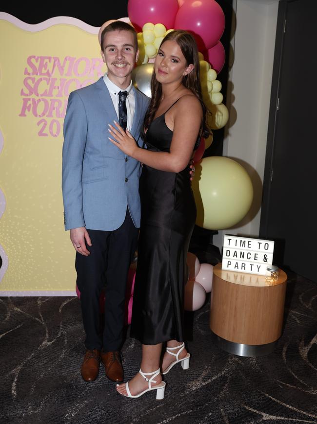 MELBOURNE, AUSTRALIA – JUNE 14 2024 Bayley Russell and Mia Koot attend the Lowanna College Senior Formal 2024 at the Moe Racing Club Picture: Brendan Beckett